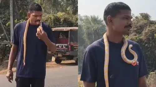 Odisha News : गले में सांप डालकर बाजार में घूमता रहा युवक