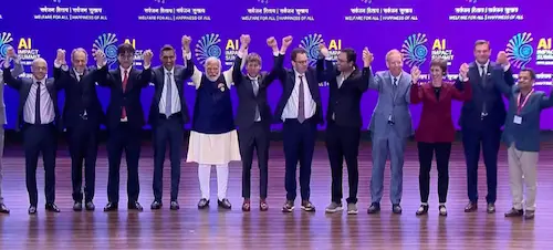 PM Modi- पीएम मोदी के साथ ग्रुप फोटो में सैम और डारियो अमोडेई के बीच दिखी नाराजगी